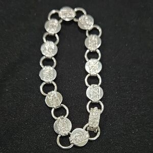 VINTAGE SARAH COVENTRY "YOUNG 'N GAY" SHINY SILVER TONE COIN STYLE BRACELET 7"